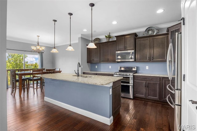 137 Countryshire Dr, Lake St Louis, MO 63367 - kitchen with stainless steel appliances, a sink, dark brown cabinetry, a chandelier, and ornamental molding