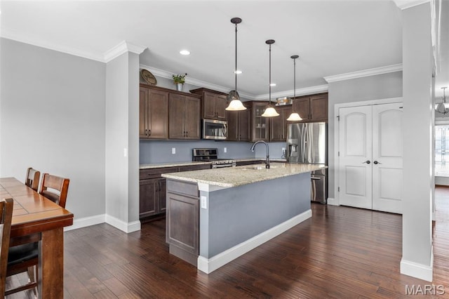 137 Countryshire Dr, Lake St Louis, MO 63367 - kitchen with appliances with stainless steel finishes, a sink, dark wood-style flooring, dark brown cabinetry, and recessed lighting