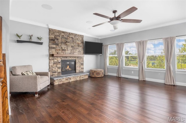 137 Countryshire Dr, Lake St Louis, MO 63367 - living area with wood finished floors, ornamental molding, a stone fireplace, ceiling fan, and baseboards