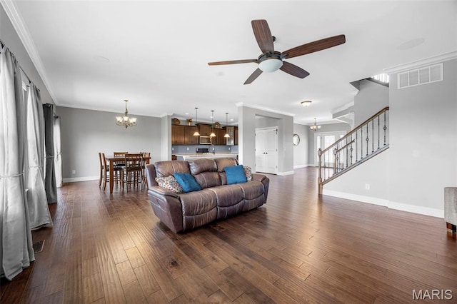 137 Countryshire Dr, Lake St Louis, MO 63367 - living room with a chandelier, stairs, ceiling fan, dark wood-style floors, and ornamental molding