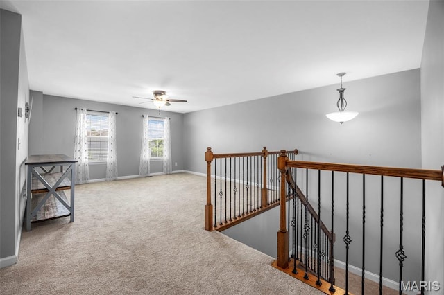 137 Countryshire Dr, Lake St Louis, MO 63367 - hall featuring an upstairs landing, carpet, and baseboards
