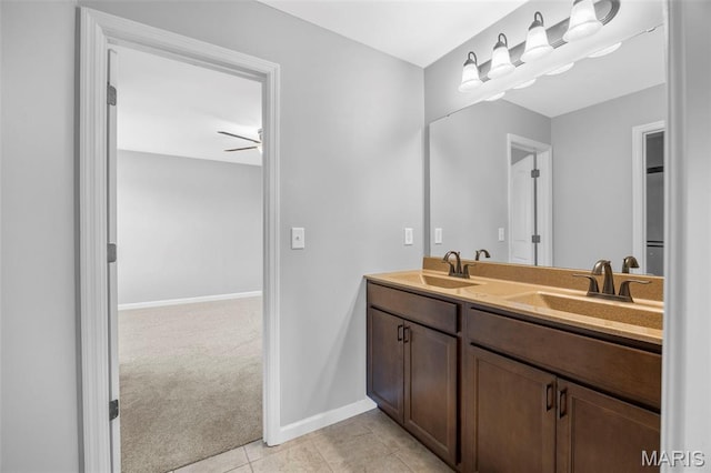 137 Countryshire Dr, Lake St Louis, MO 63367 - full bathroom with double vanity, baseboards, and tile patterned floors
