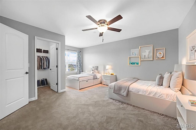 137 Countryshire Dr, Lake St Louis, MO 63367 - carpeted bedroom with a spacious closet, a ceiling fan, baseboards, and a closet