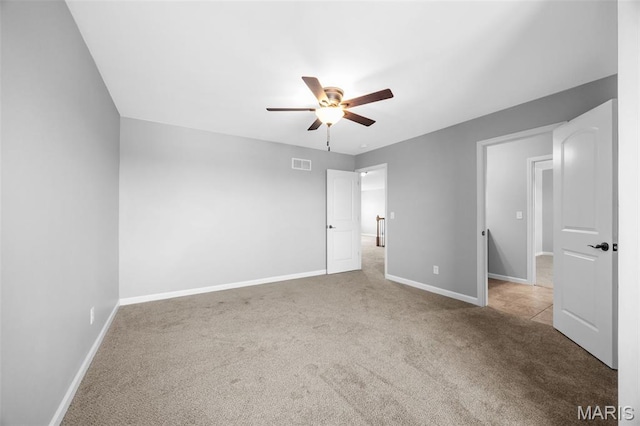 137 Countryshire Dr, Lake St Louis, MO 63367 - unfurnished bedroom with carpet, baseboards, and ceiling fan