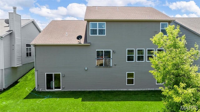 137 Countryshire Dr, Lake St Louis, MO 63367 - rear view of house with a lawn