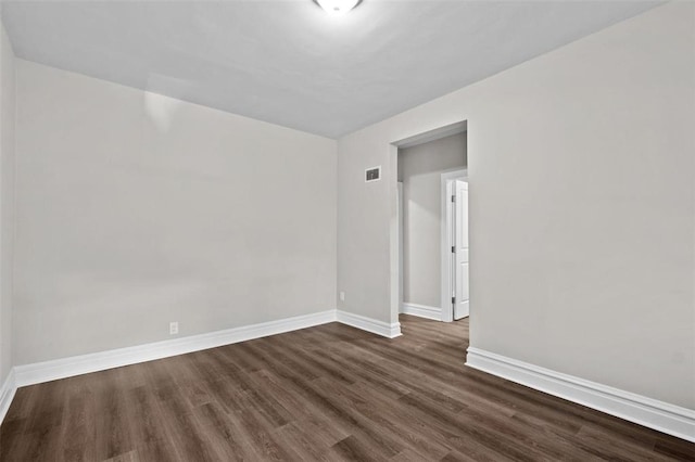 5039 Grace Ave, Saint Louis, MO 63116 - spare room with wood finished floors and baseboards
