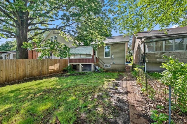5039 Grace Ave, Saint Louis, MO 63116 - rear view of house featuring entry steps