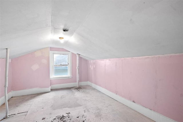 5039 Grace Ave, Saint Louis, MO 63116 - additional living space with vaulted ceiling and baseboards