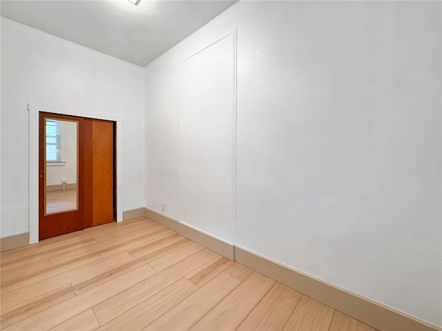 unfurnished room featuring wood finished floors