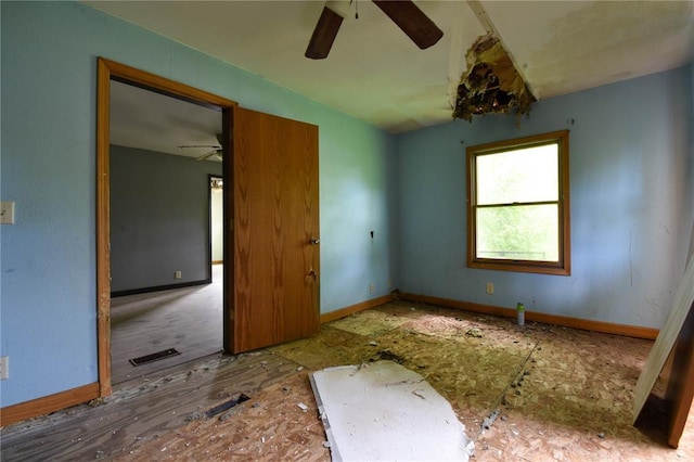 880 W Nicholas St, Carlinville, IL 62626 - unfurnished room with ceiling fan and baseboards