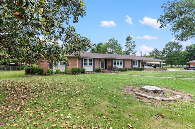 102 E Charlotte, Lilbourn, MO 63862 - single story home with brick siding, a front lawn, and a carport