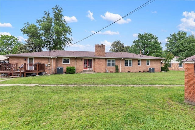 102 E Charlotte, Lilbourn, MO 63862 - rear view of house featuring central AC unit, a chimney, and a yard
