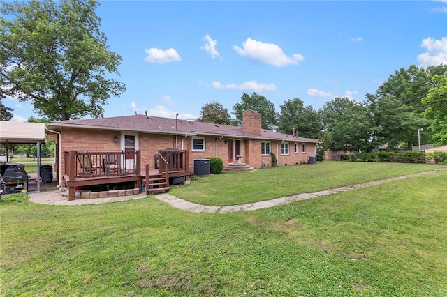 102 E Charlotte, Lilbourn, MO 63862 - rear view of house featuring central air condition unit, a chimney, brick siding, and a lawn