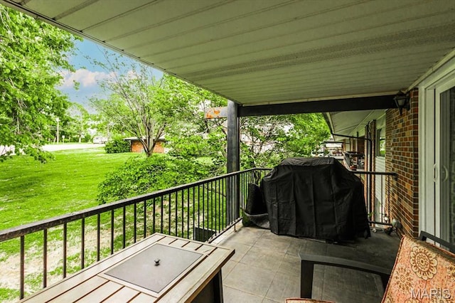 10077 N Bunker Hill Dr Unit F, Mehlville, MO 63123 - patio / terrace with a grill