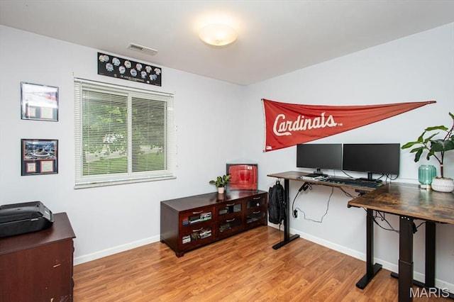 10077 N Bunker Hill Dr Unit F, Mehlville, MO 63123 - office featuring light wood-type flooring and baseboards