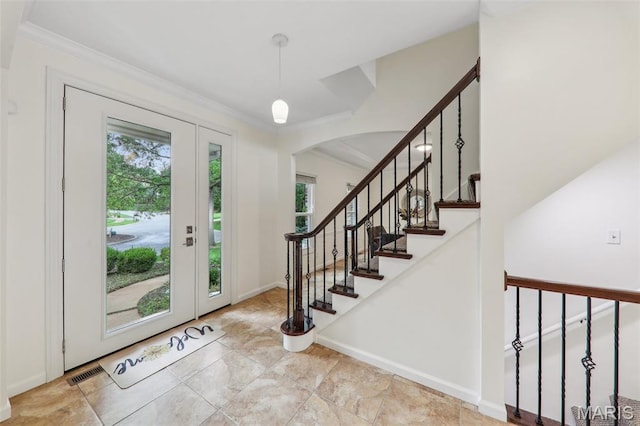 200 Hibler Oaks Dr, Creve Coeur, MO 63141 - entryway featuring plenty of natural light, arched walkways, crown molding, and stairway