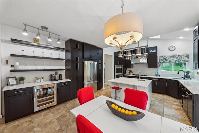 200 Hibler Oaks Dr, Creve Coeur, MO 63141 - kitchen with beverage cooler, stainless steel appliances, open shelves, a sink, and light countertops