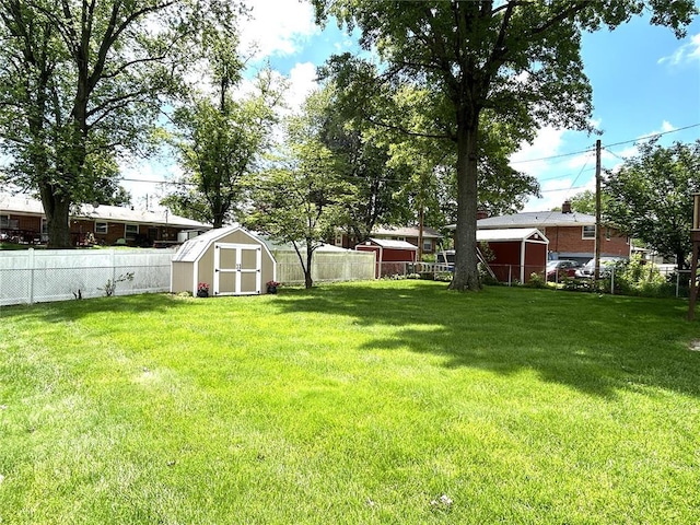 view of yard with a shed and an outdoor structure