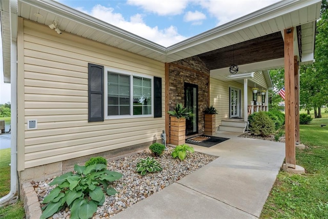 12930 Mohawk Dr, De Soto, MO 63020 - view of exterior entry with a porch
