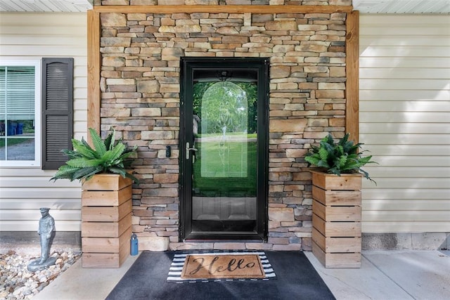12930 Mohawk Dr, De Soto, MO 63020 - view of exterior entry with stone siding