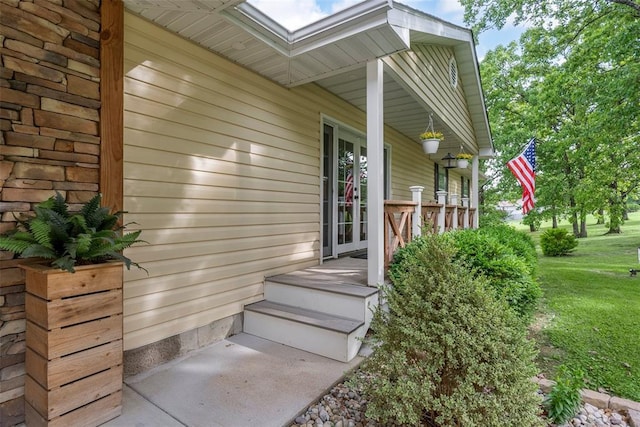 12930 Mohawk Dr, De Soto, MO 63020 - doorway to property featuring a porch and a yard