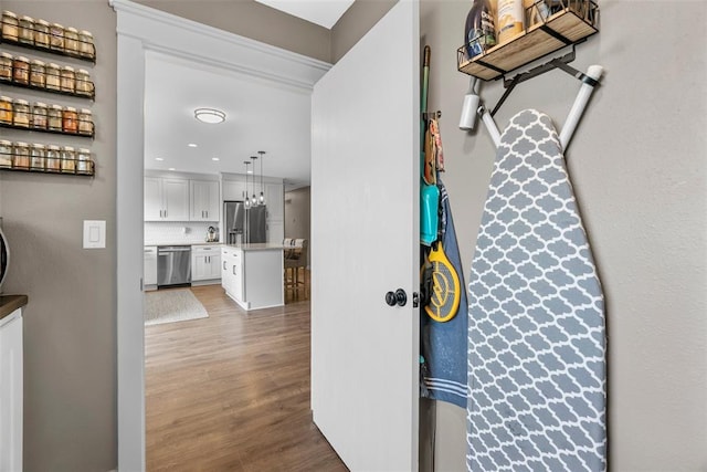 12930 Mohawk Dr, De Soto, MO 63020 - hallway with light wood-style floors and recessed lighting
