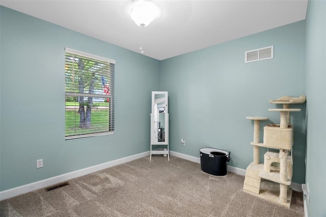 12930 Mohawk Dr, De Soto, MO 63020 - carpeted empty room featuring baseboards
