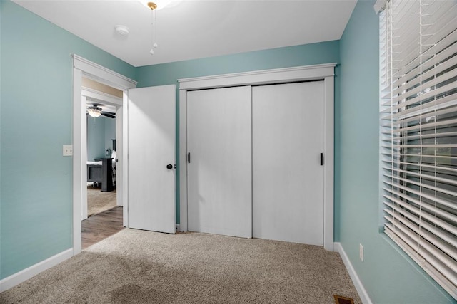 12930 Mohawk Dr, De Soto, MO 63020 - unfurnished bedroom featuring carpet floors, a closet, and baseboards
