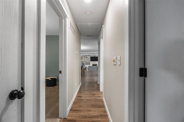 12930 Mohawk Dr, De Soto, MO 63020 - corridor with baseboards and dark wood-style floors