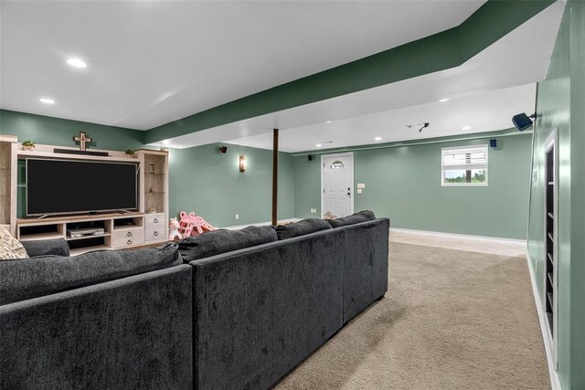 12930 Mohawk Dr, De Soto, MO 63020 - cinema room featuring light colored carpet, recessed lighting, and baseboards