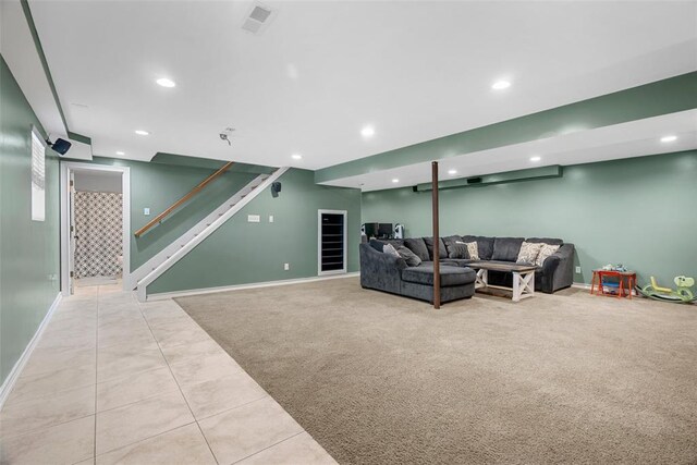12930 Mohawk Dr, De Soto, MO 63020 - carpeted living area featuring recessed lighting, stairway, baseboards, and tile patterned floors