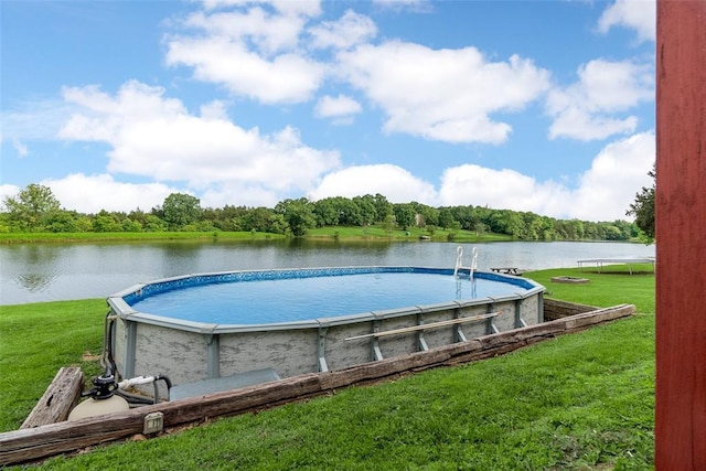 12930 Mohawk Dr, De Soto, MO 63020 - swimming pool featuring a yard and a water view