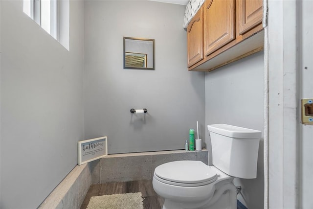12930 Mohawk Dr, De Soto, MO 63020 - bathroom featuring toilet and wood finished floors