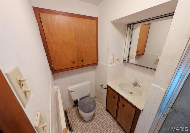 820 Lebanon Ave, Belleville, IL 62221 - bathroom featuring vanity, tile patterned flooring, and tile walls