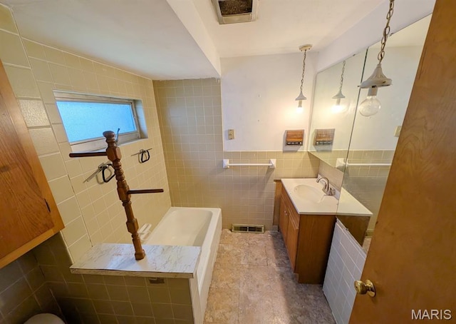 820 Lebanon Ave, Belleville, IL 62221 - full bathroom with tile walls, vanity, and a bathtub