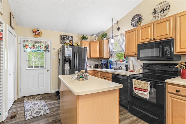 1767 Rue Andre, Bonne Terre, MO 63628 - kitchen with black appliances, a sink, a textured ceiling, dark wood-style floors, and light brown cabinets