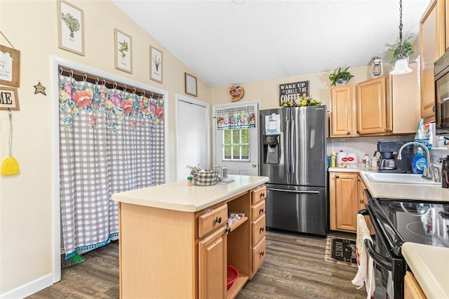 1767 Rue Andre, Bonne Terre, MO 63628 - kitchen featuring stainless steel fridge, dark wood-type flooring, a sink, light countertops, and vaulted ceiling