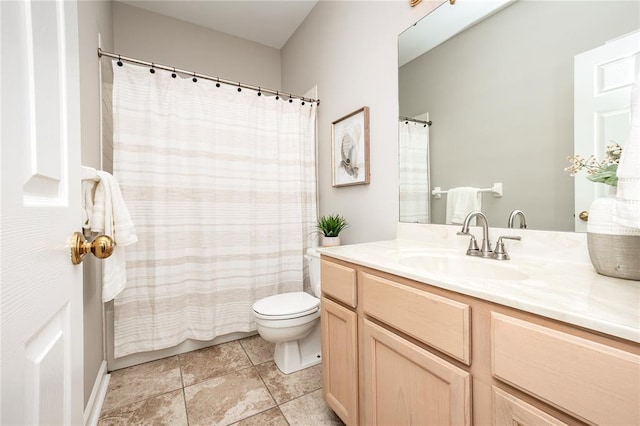 full bathroom with toilet, vanity, and a shower with curtain