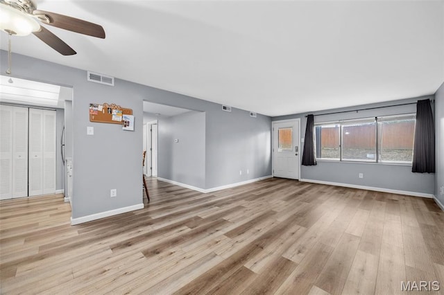 11 Fairways Cir Unit A, Saint Charles, MO 63303 - empty room with a ceiling fan, wood finished floors, and baseboards