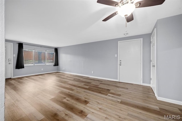 11 Fairways Cir Unit A, Saint Charles, MO 63303 - unfurnished room with a ceiling fan, wood finished floors, and baseboards