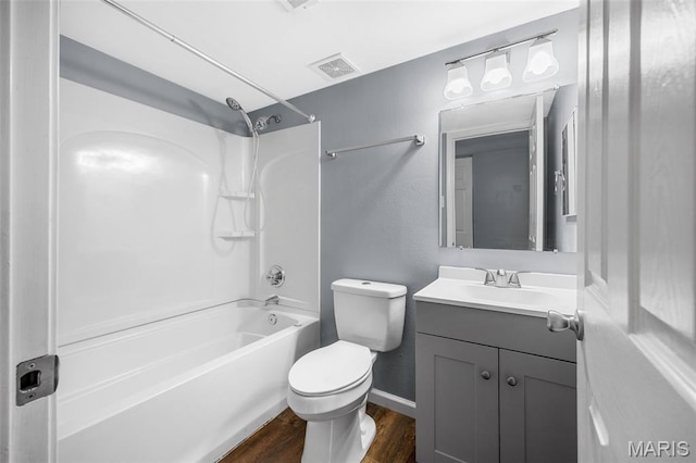 11 Fairways Cir Unit A, Saint Charles, MO 63303 - full bathroom with vanity, toilet, wood finished floors, shower / tub combination, and baseboards