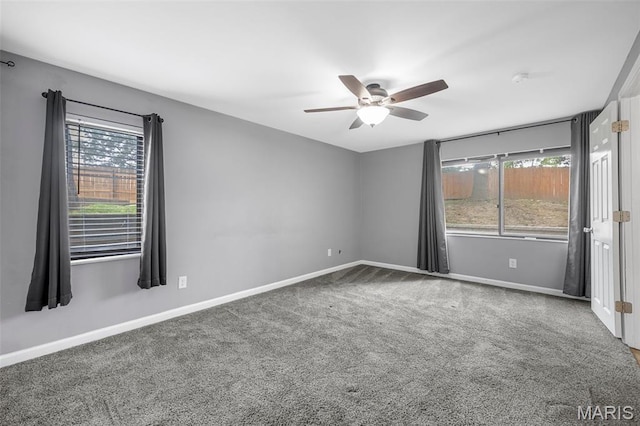 11 Fairways Cir Unit A, Saint Charles, MO 63303 - carpeted spare room featuring plenty of natural light, a ceiling fan, and baseboards