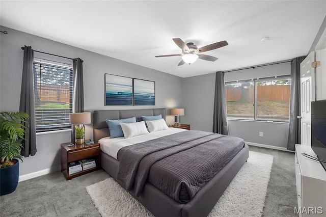 11 Fairways Cir Unit A, Saint Charles, MO 63303 - bedroom with carpet flooring, baseboards, and ceiling fan