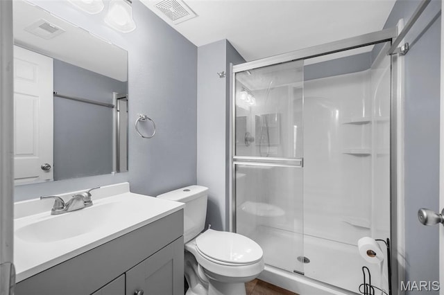11 Fairways Cir Unit A, Saint Charles, MO 63303 - full bathroom featuring a stall shower, vanity, and toilet