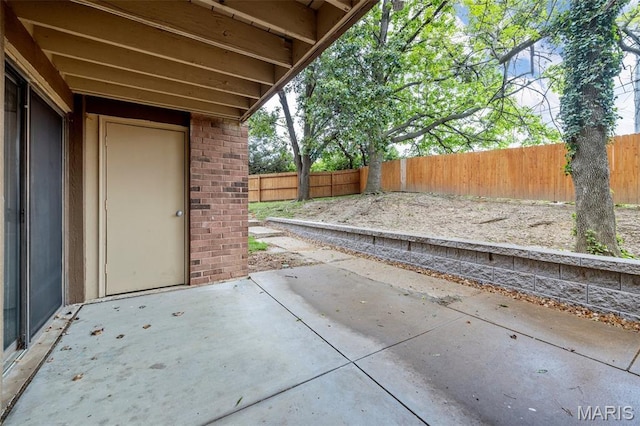 11 Fairways Cir Unit A, Saint Charles, MO 63303 - fenced backyard featuring a patio area