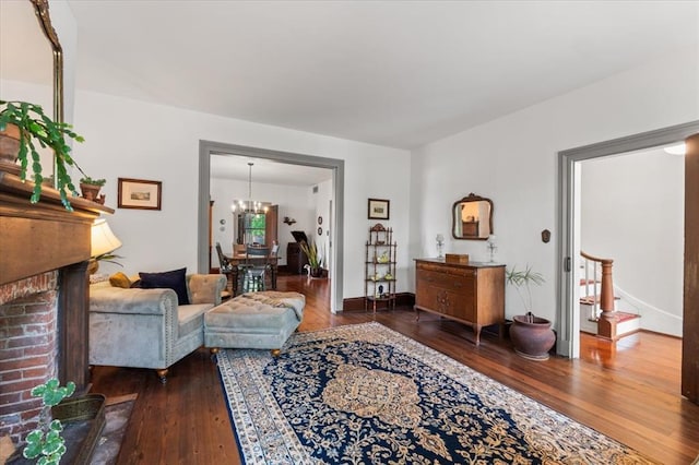 100 W Alton St, Marine, IL 62061 - living room featuring hardwood / wood-style floors, a chandelier, and baseboards