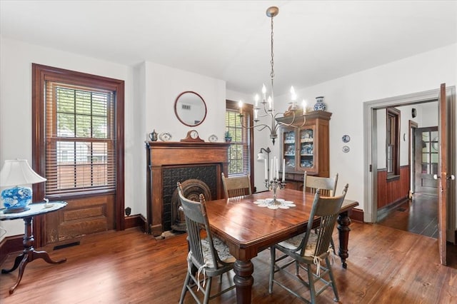100 W Alton St, Marine, IL 62061 - dining space featuring wood finished floors, a chandelier, and plenty of natural light