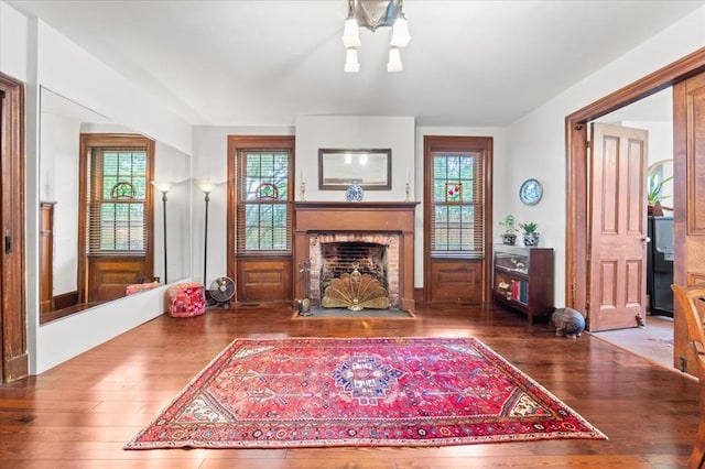 100 W Alton St, Marine, IL 62061 - living room featuring wood-type flooring and a brick fireplace
