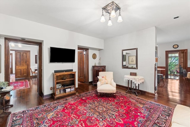 100 W Alton St, Marine, IL 62061 - living area featuring hardwood / wood-style floors, a chandelier, and baseboards