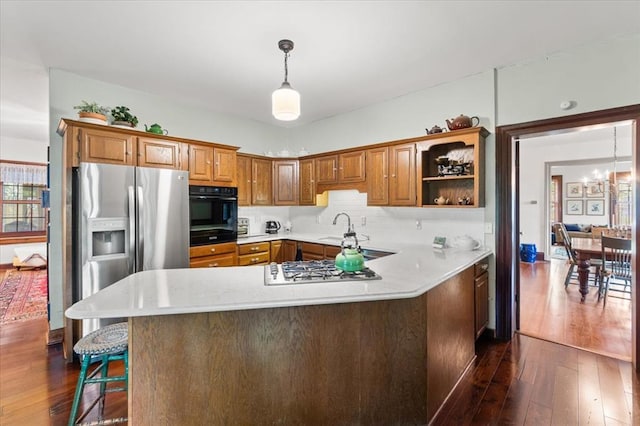 100 W Alton St, Marine, IL 62061 - kitchen with stainless steel appliances, dark wood finished floors, and light countertops